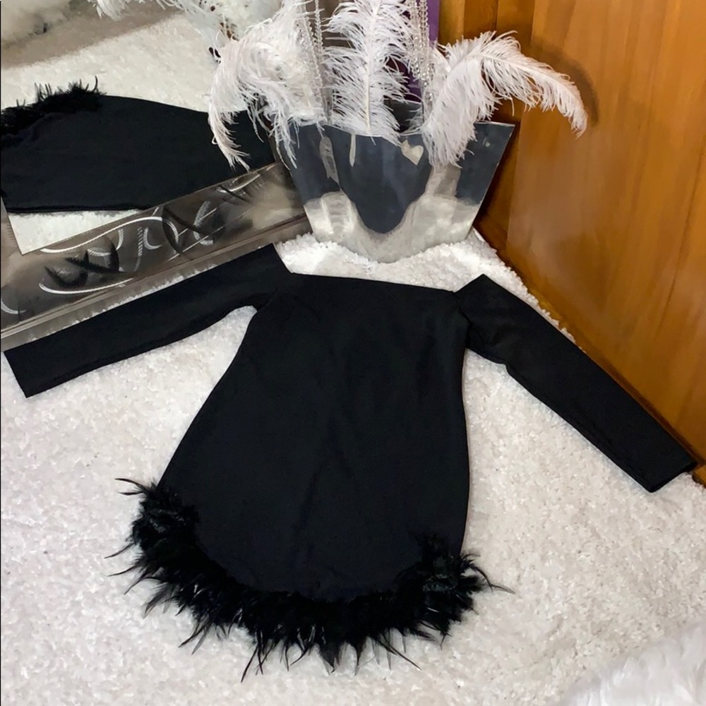 Black strapless mini dress with feathers
